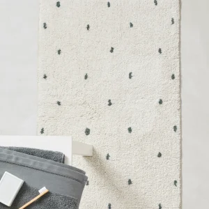 Tapis de bain à pois
